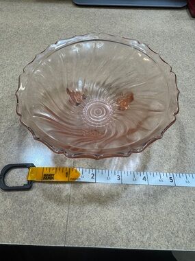 Pink Depression glass candy dish in 'Swirl' pattern by Jeannette Glass Company